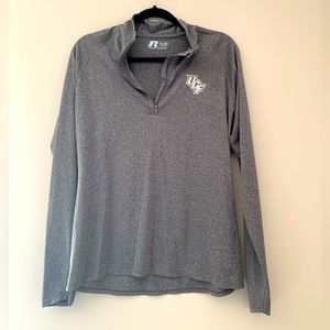 UCF branded Heather grey long sleeve moisture wicking half zip